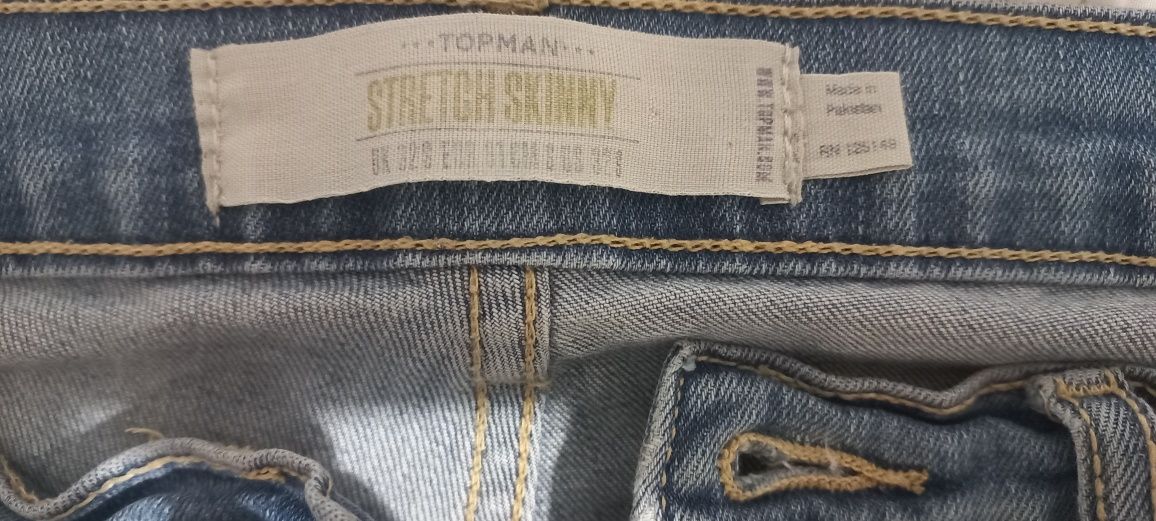 Jasnoniebieskie wytarte damskie jeansy dżinsy spodnie na guziki L XL