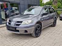 Mitsubishi Outlander 2.0 + GAZ Klimatyzacja Elektryczne Szyby Radio CD Alufelgi