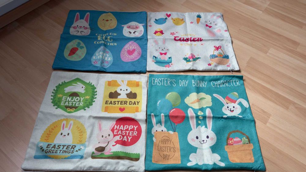 Zestaw czterech ozdobnych wielkanocnych poszewek 45x45