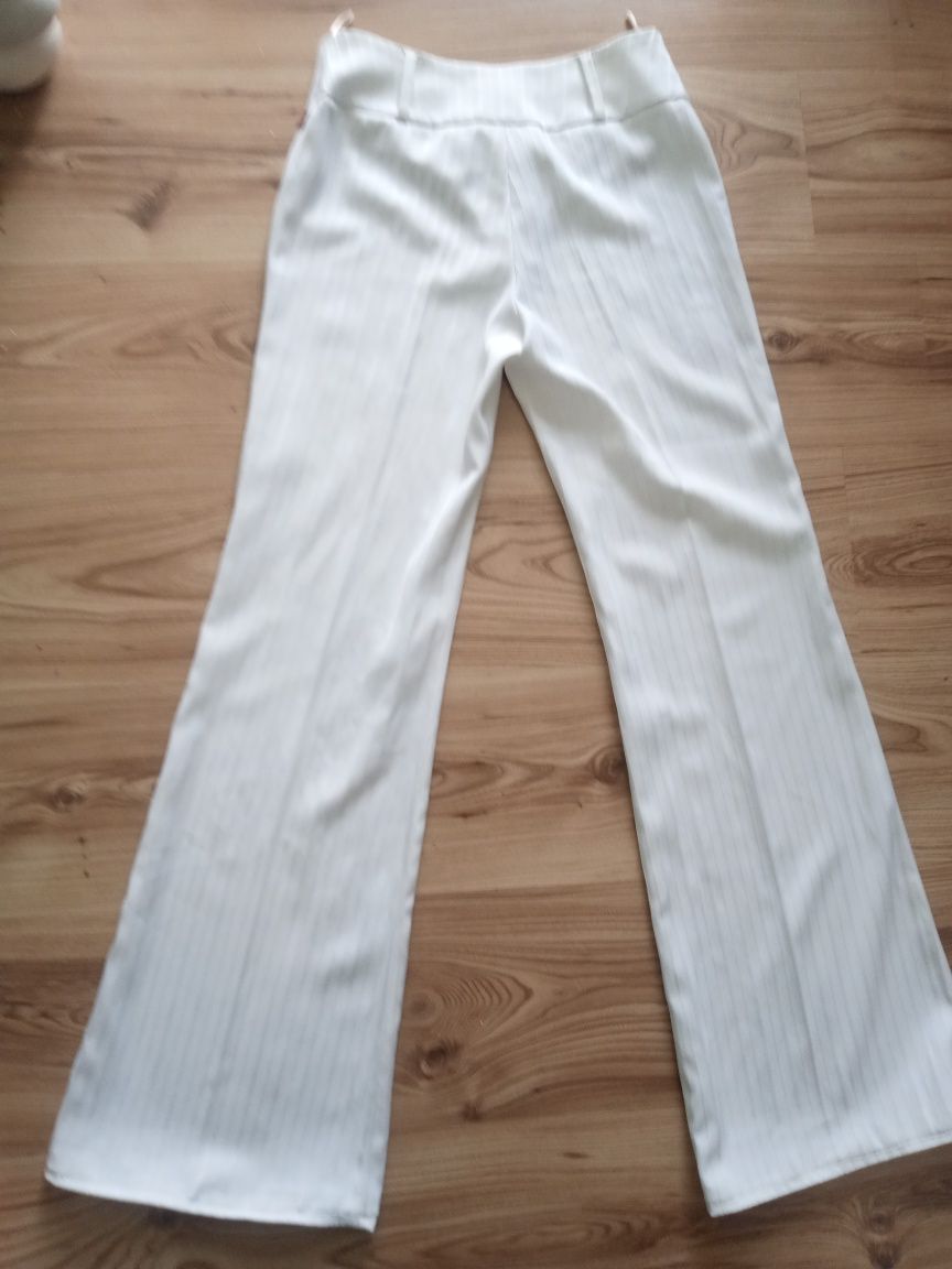 Białe eleganckie spodnie z szerokimi nogawkami, rozmiar 36