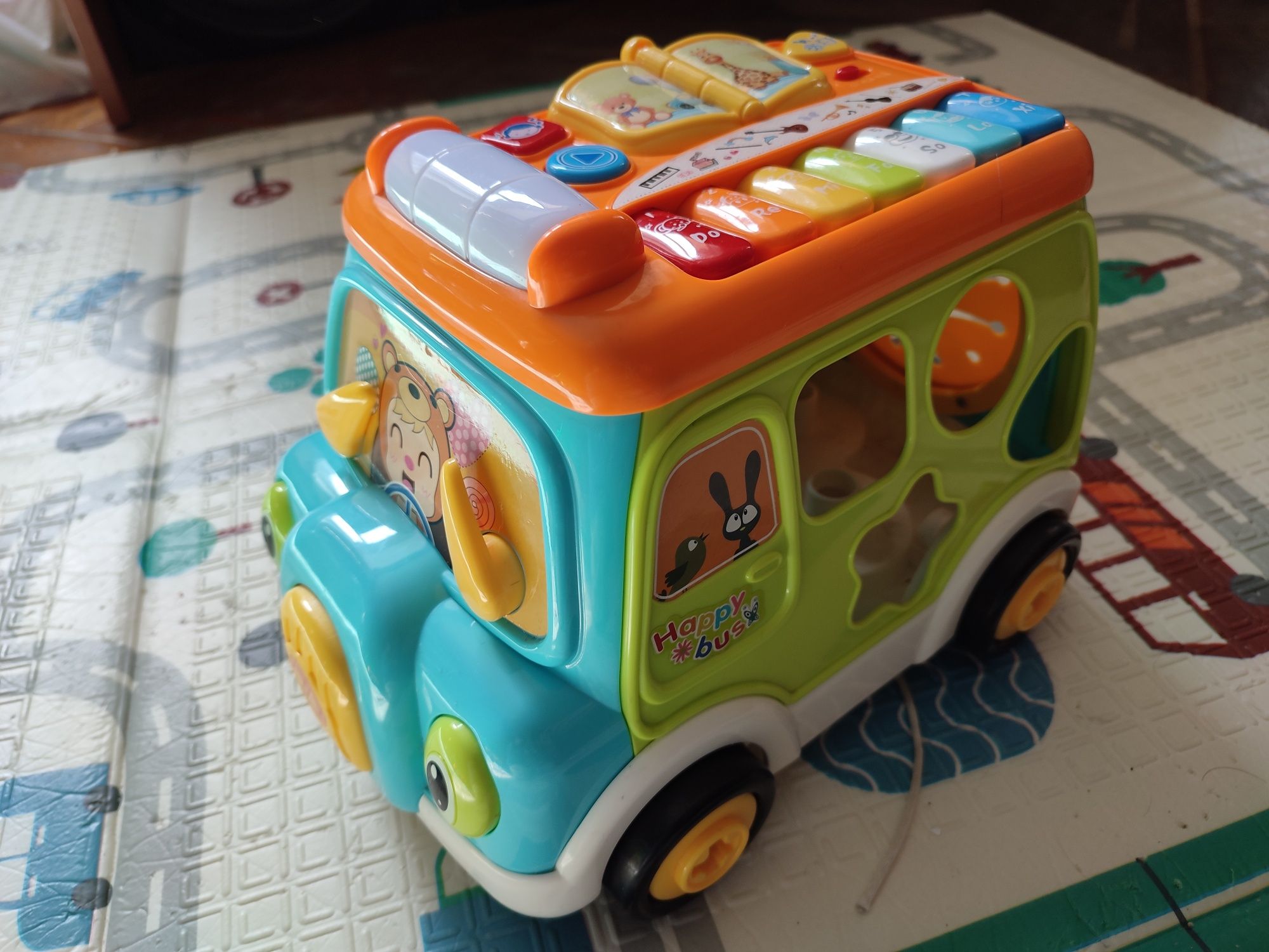 Музична іграшка автобус, на батарейках.