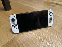 Switch OLED + karta 256gb + etui + nakladki na joyCony, analogi + HDMI