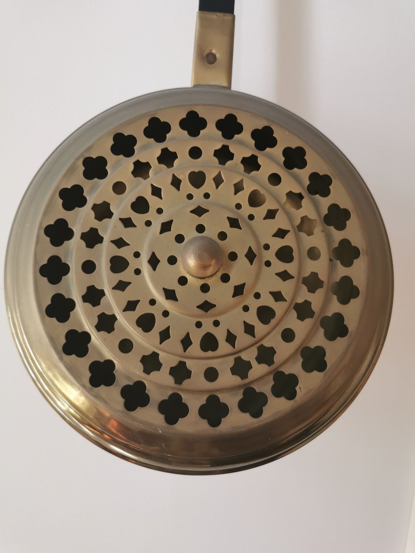 Antigo aquecedor de cama