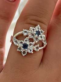 Серебряное кольцо с небесно -голубым топазом и сапфиром.Размер17.75