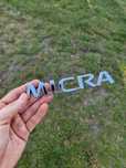 Oryginalny emblemat Nissan Micra K12