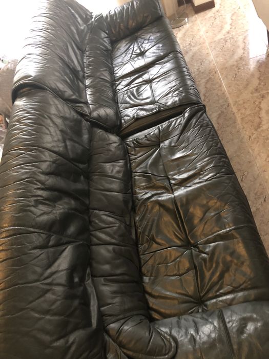 Sofá de canto verde garrafa