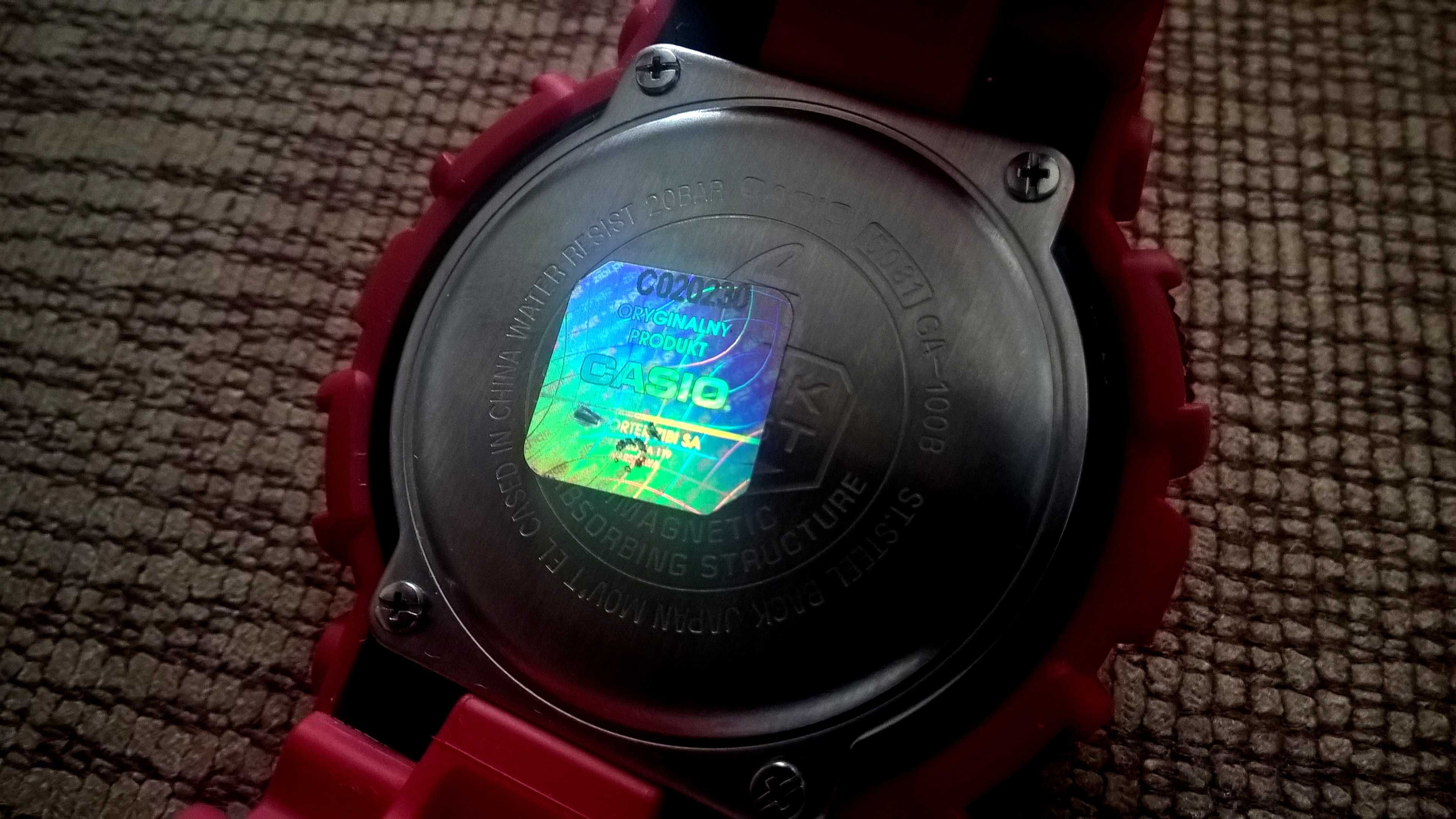 Casio G-Shock GA-100CM 4A  czerwony moro idealny stan