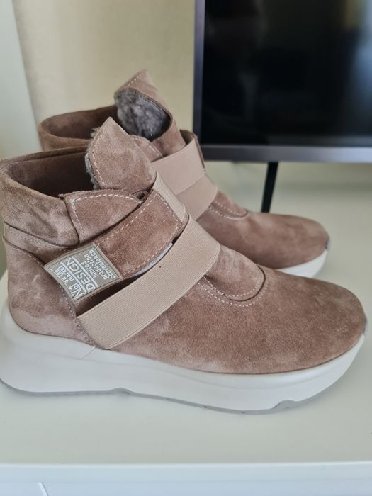 Продам новые ботинки зимние