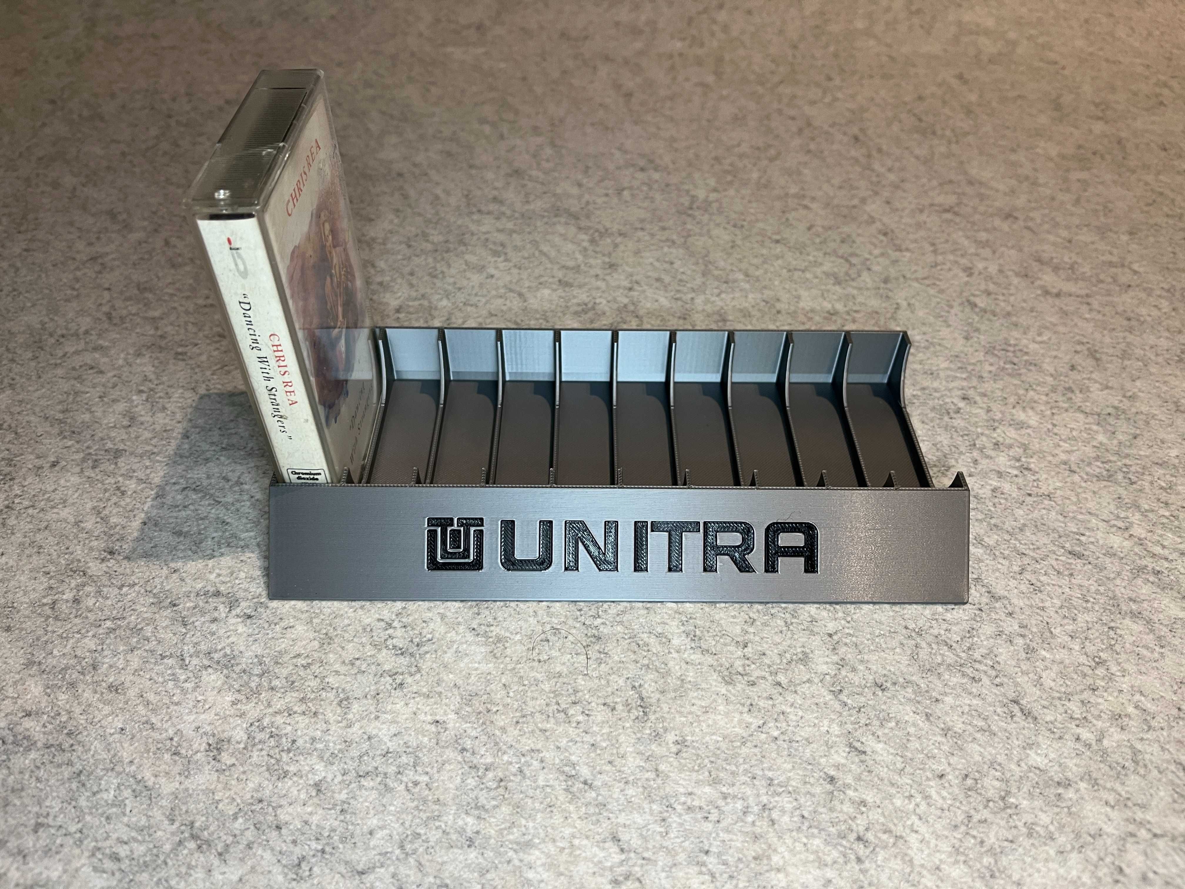Stojak podstawka na 10 kaset magnetofonowych Unitra srebrna