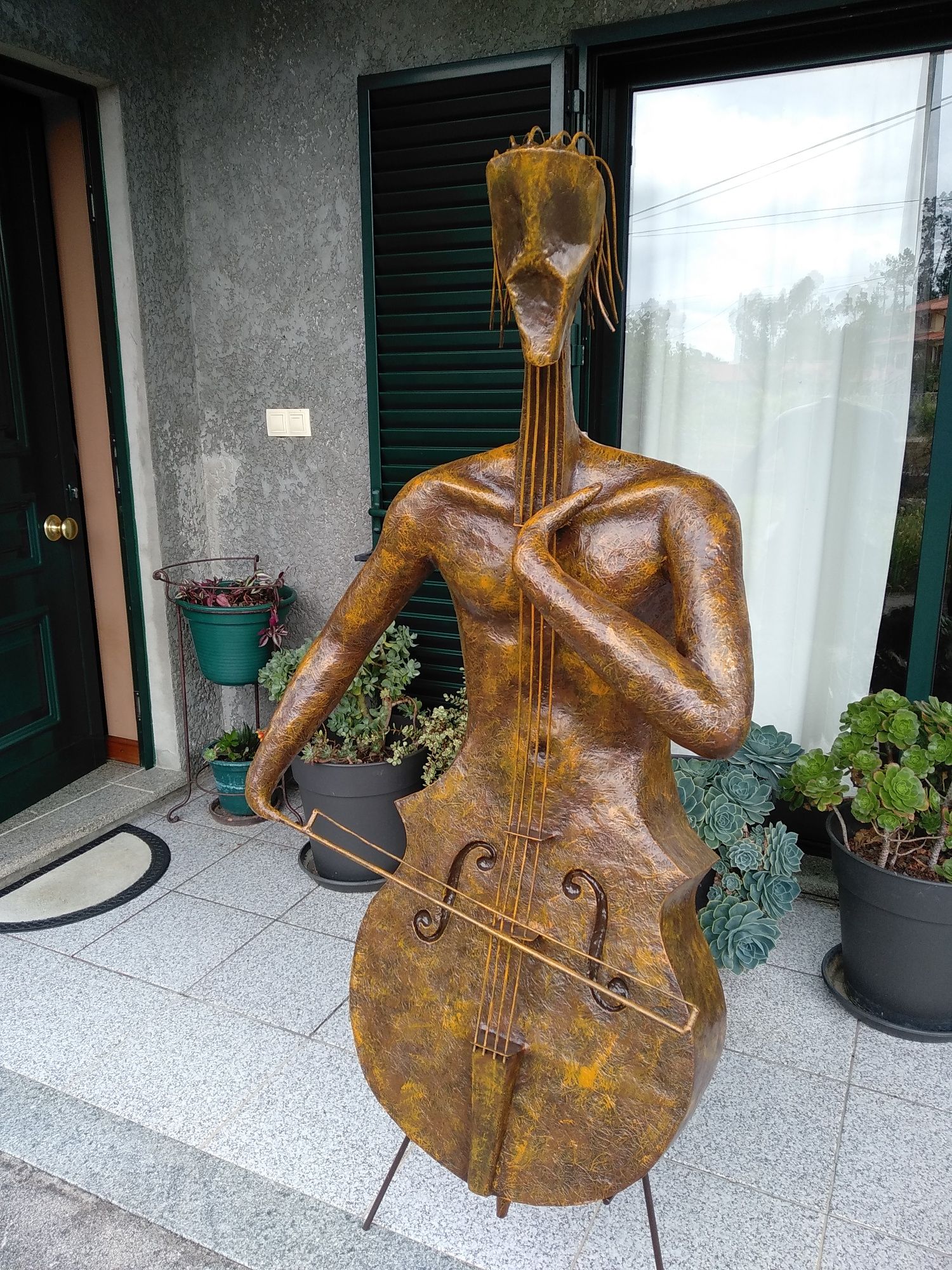 Violoncelo , escultura