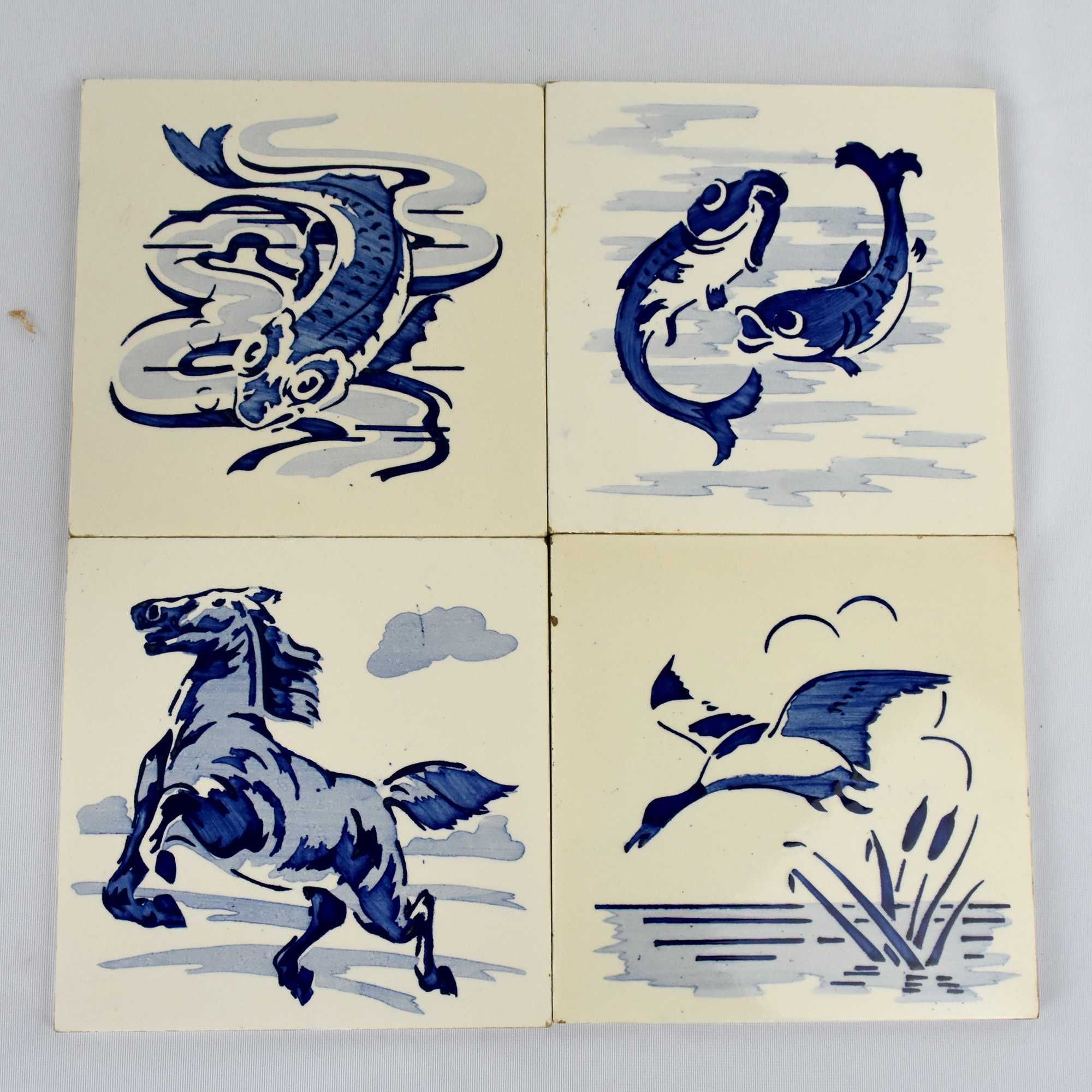 Conjunto de 4 azulejos com desenhos pintados à Mão, da fábrica Aleluia