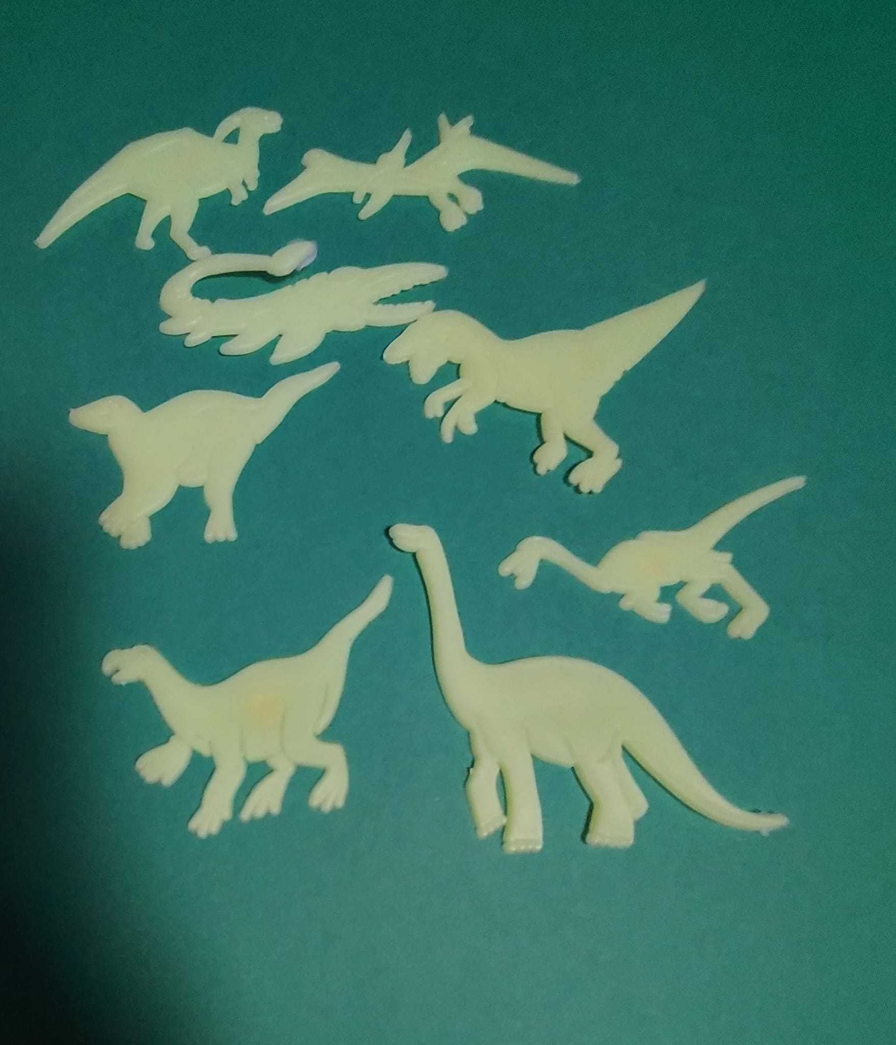 Dinossauros , estrelas e cometas que brilham no escuro