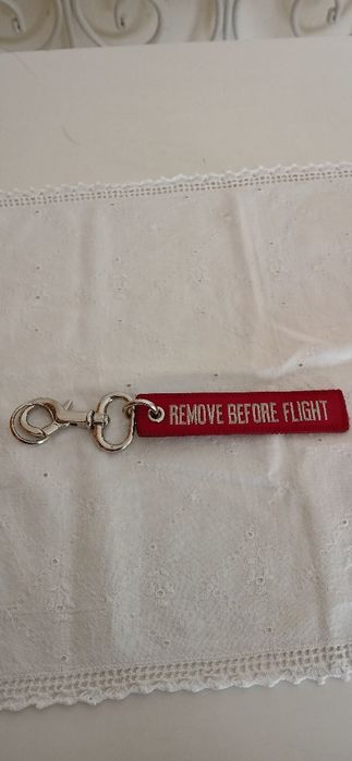Porta-chaves Remove before flight