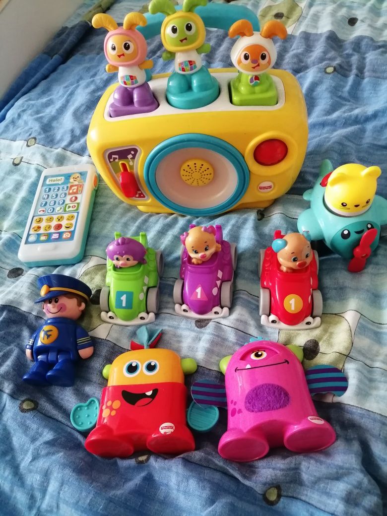 Zestaw zabawek fisher price telefon szczeniaczka radio grające samoch