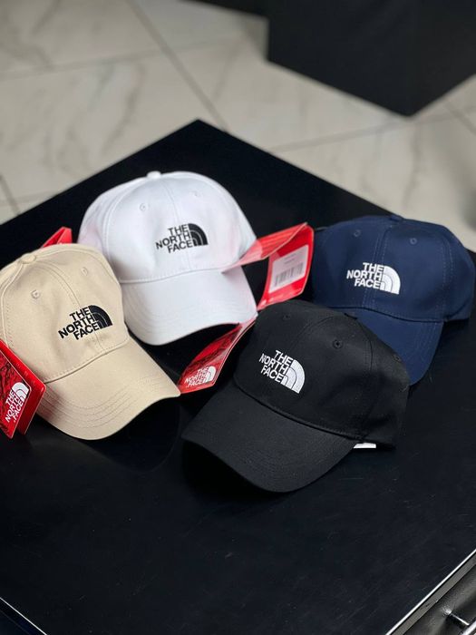 Кепки від бренду The North Face