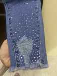 Spodnie jeansy cyrkonie przetarcia redseventy