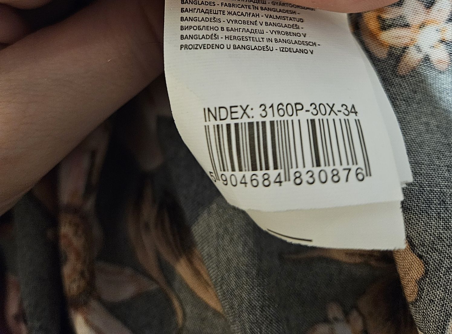 Długa sukienka w kwiaty Reserved 34
