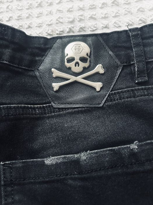 Philipp Plein spodnie meskie czarne dziury nakrapiane
