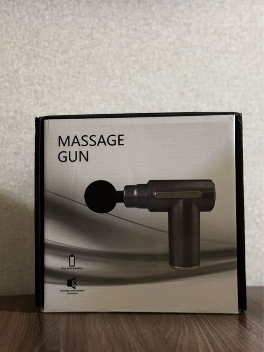 Масажний пістолет