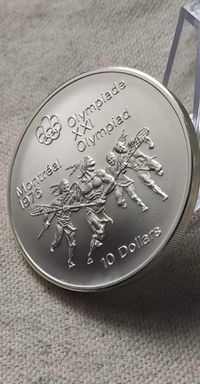 Дивовижна срібна монета. 10 доларів 1974 року " Лакросс" 48,6 грам