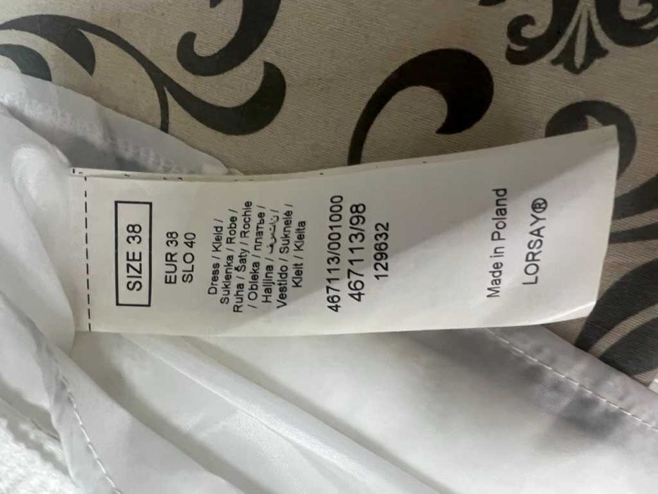 Rozkloszowana biała sukienka ze złotymi akcentami Orsay 38 bride