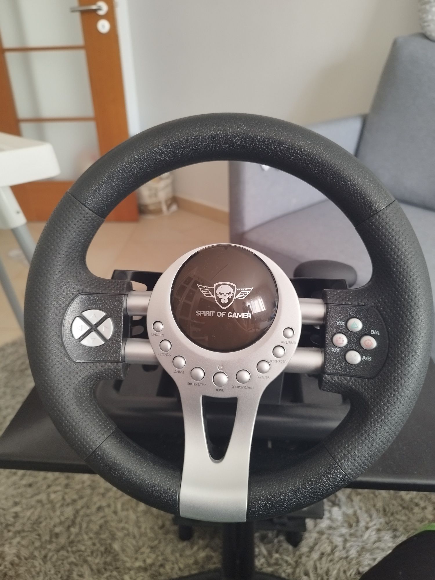 Cadeira para jogos com volante