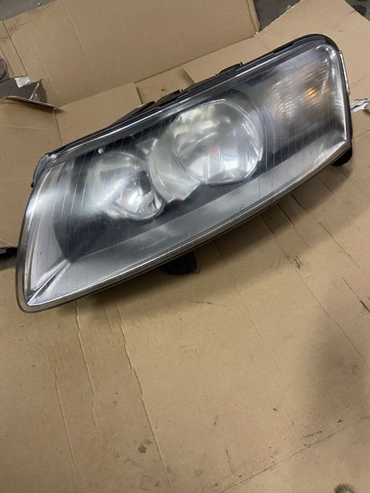 Lampa lewa hella audi a6 c6 h7 EU