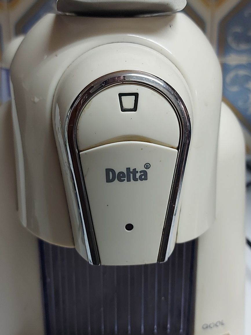 Máquina de café delta q