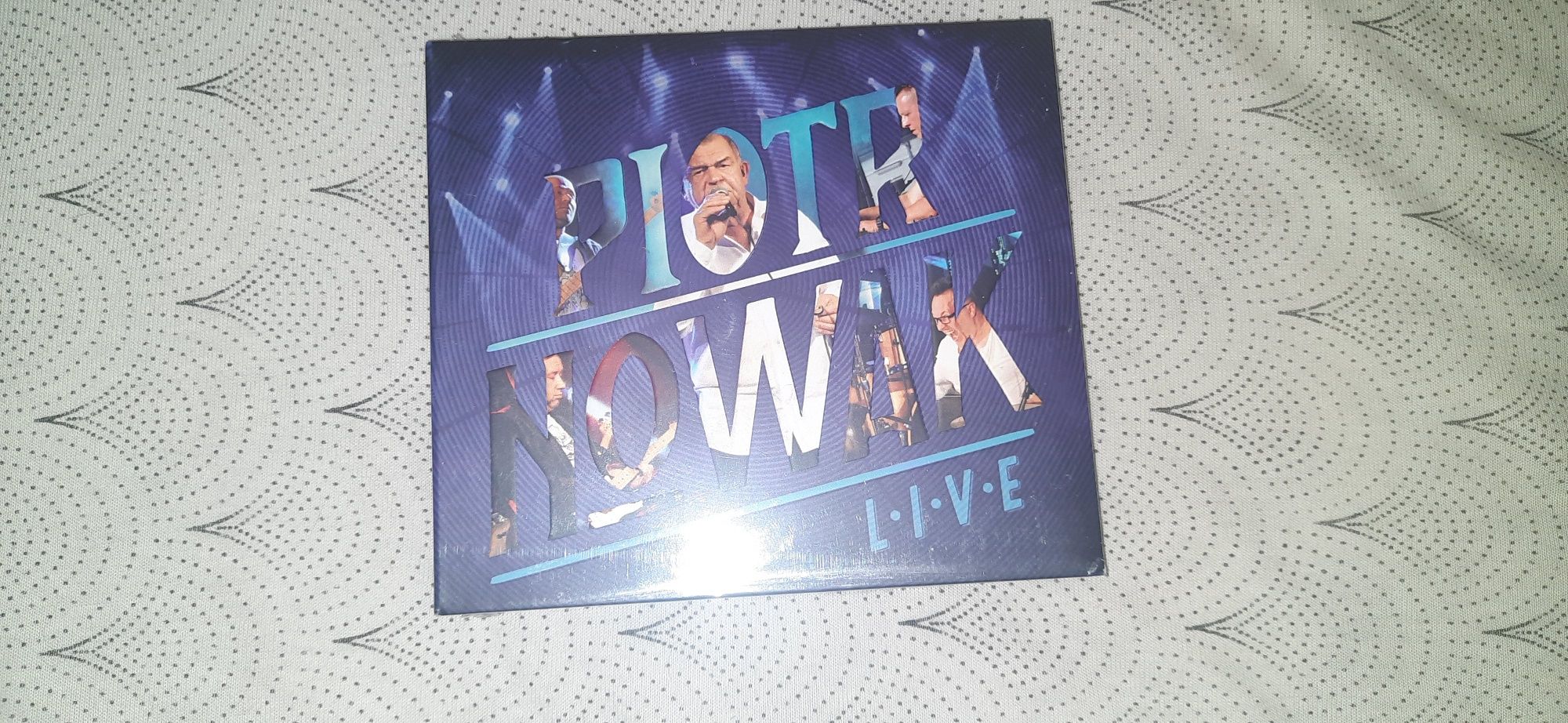 Płyta CD i DVD Piotr Nowak Live  nowa