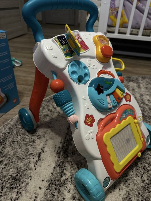 Ходунки каталка з ігровим центром