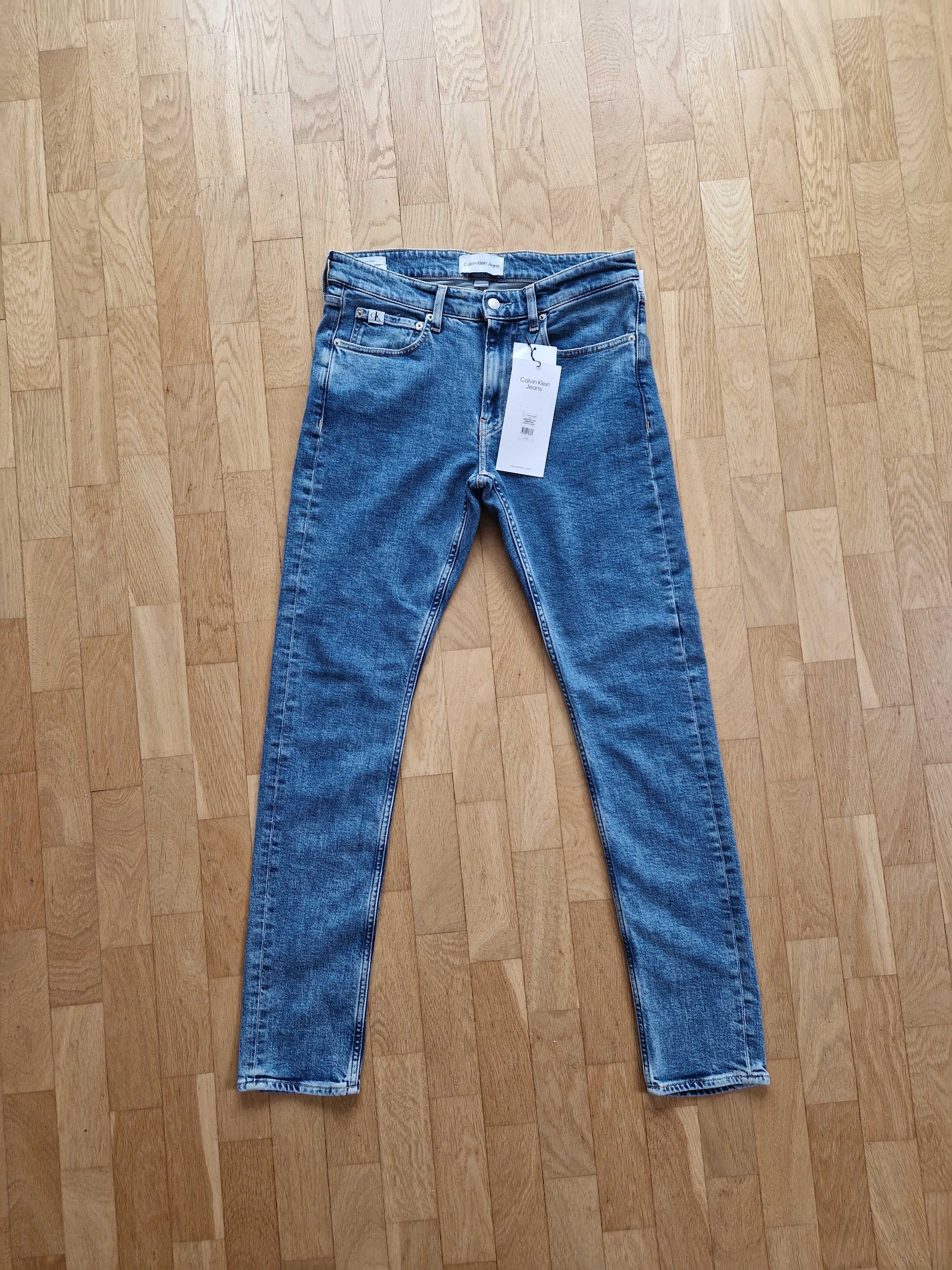 Nowe dżinsy męskie Calvin Klein rozmiar W31 L34 z metką