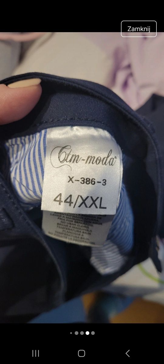 Eleganckie spodnie granatowe 40-44 nowe bez metki