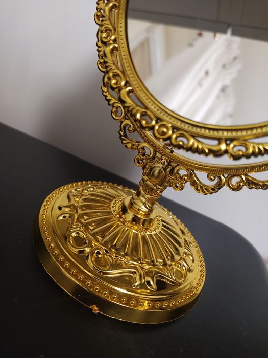 Obustronne złote lusterko