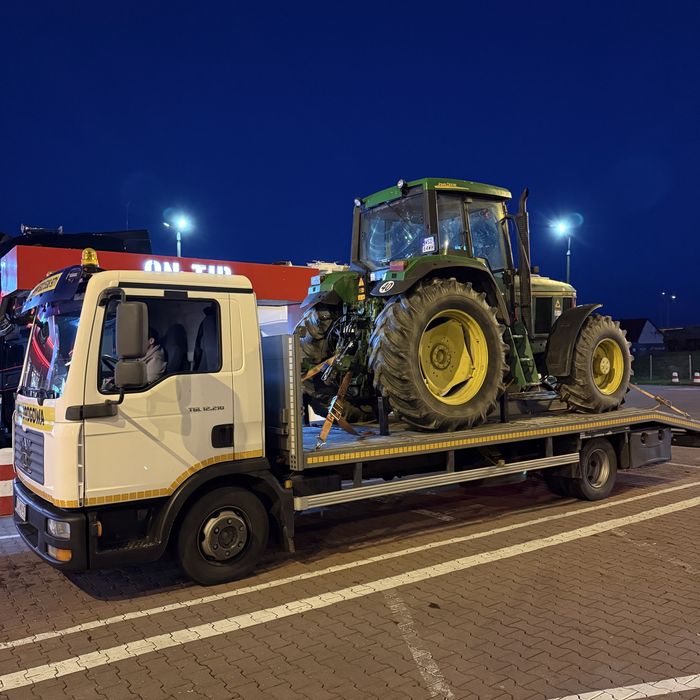 Pomoc drogowa, holowanie, laweta transport maszyn budowlanych rolnicze