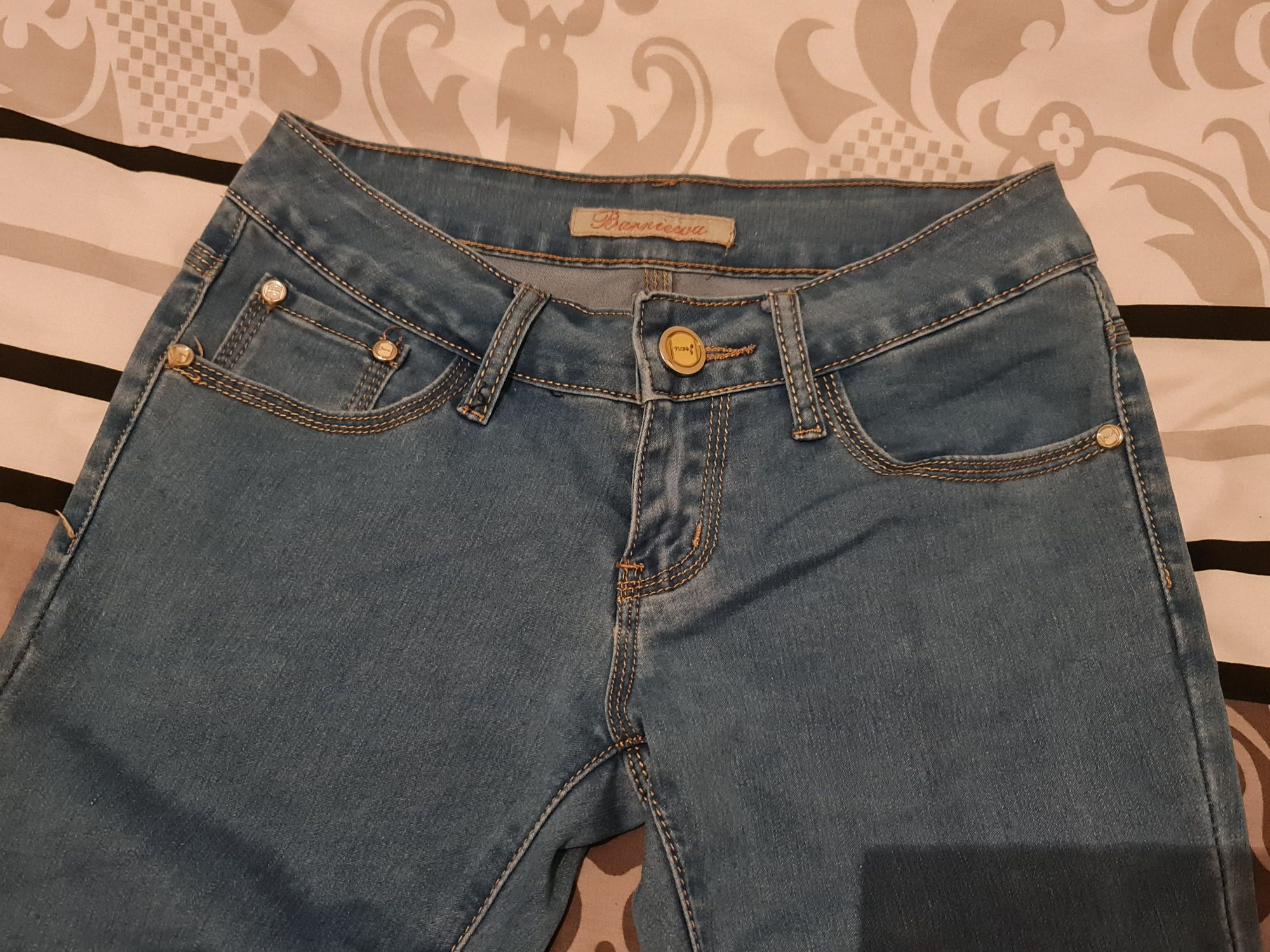 Spodnie damskie jeans rozmiar 25 S niebieski