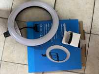 Ring light cim tripé, que pode esrar a diferentes alturas