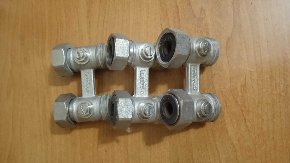 Узел нижнего подключения радиатора (бинокль) Simplex