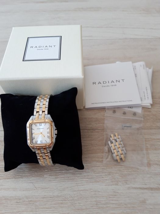 Relógio prateado e dourado Radiant