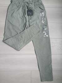 Spodnie elastyczne zielone 40 42,44 cekiny cygaretki modne wygodne