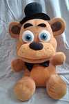 Big fnaf plushie whit tag.