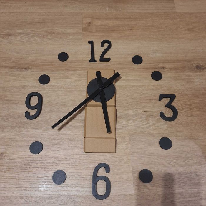 Zegar czarny klejony na ściane nowy