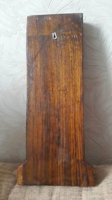 Резной крест из натурального дерева.
