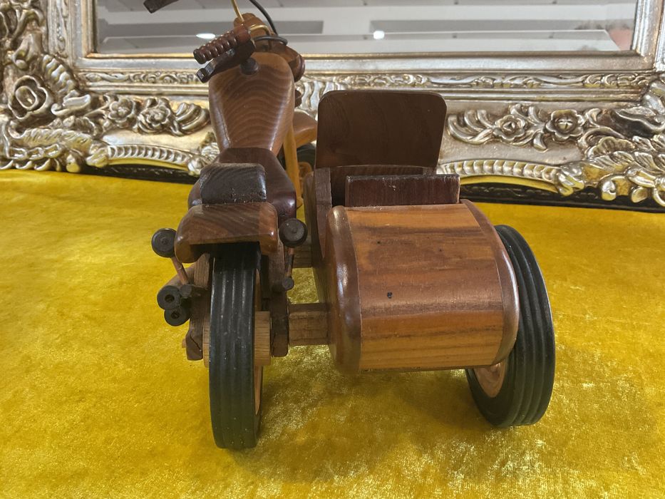 Mota em madeira decoração