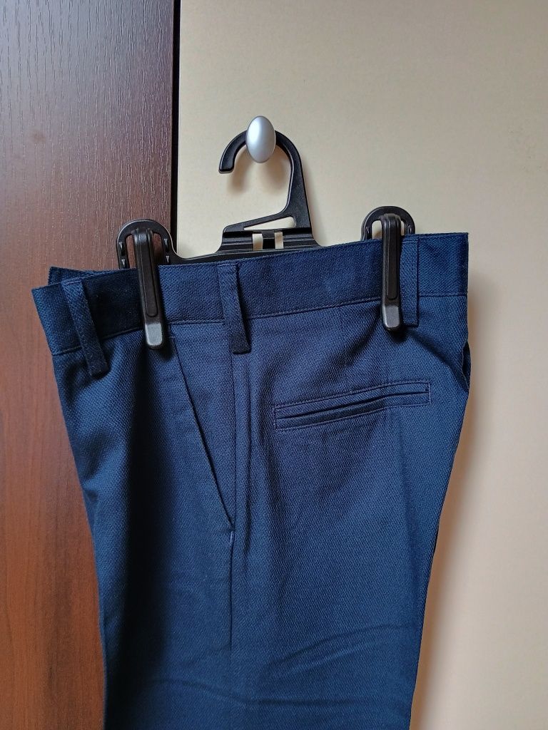 Eleganckie spodnie na kantkę r.122