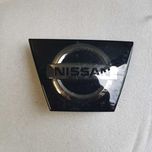 emblemat grilla Nissan Micra K14
