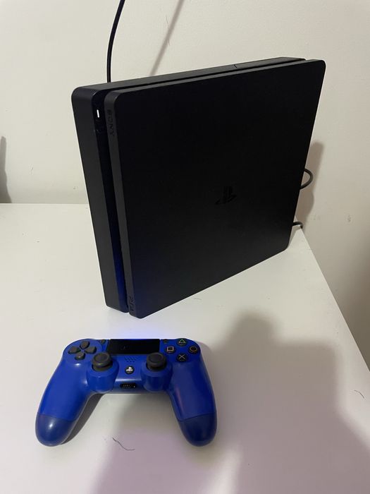 Vendo ps4 slim 500gb com cabos e comando ler anunico!