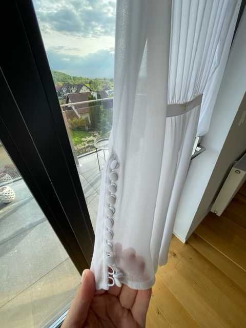 Piękna i delikatna sukienka ślubna