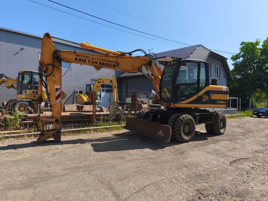 Колісний екскаватор повноповоротний екскаватор JCB JS145 2002року