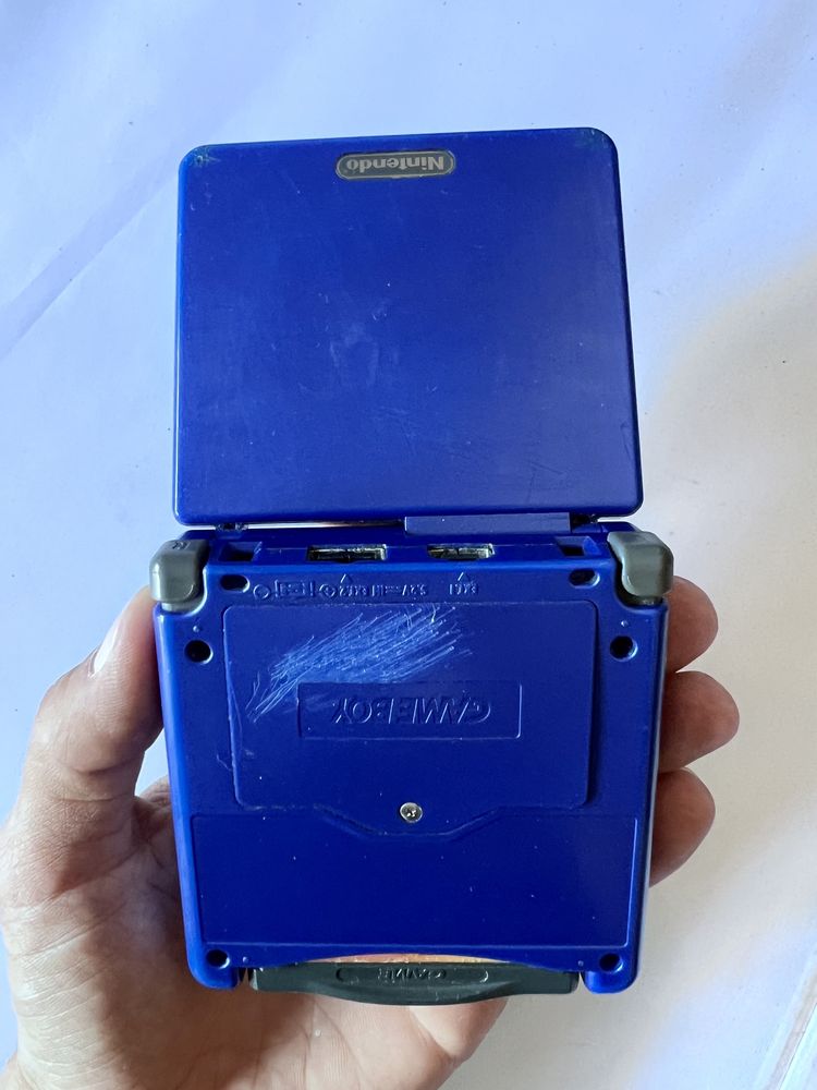 Gameboy advance sp azul com carregador e 4 jogos