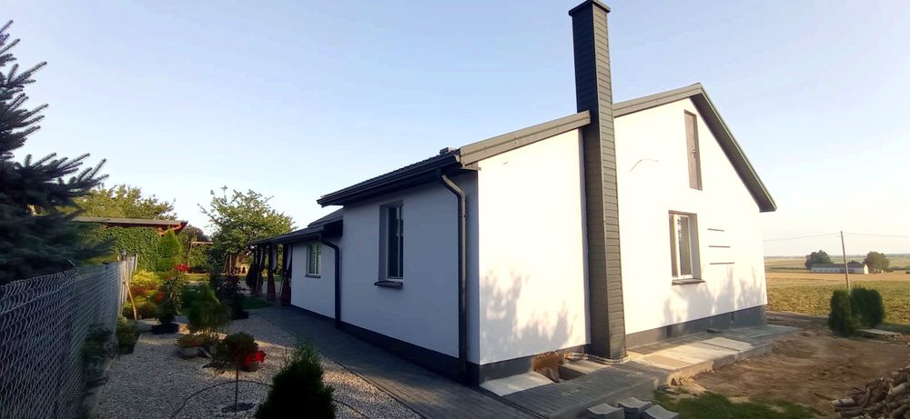 Dom i gospodarstwo rolne o powierzchni 6,43 ha i 1,20 ha lasu.